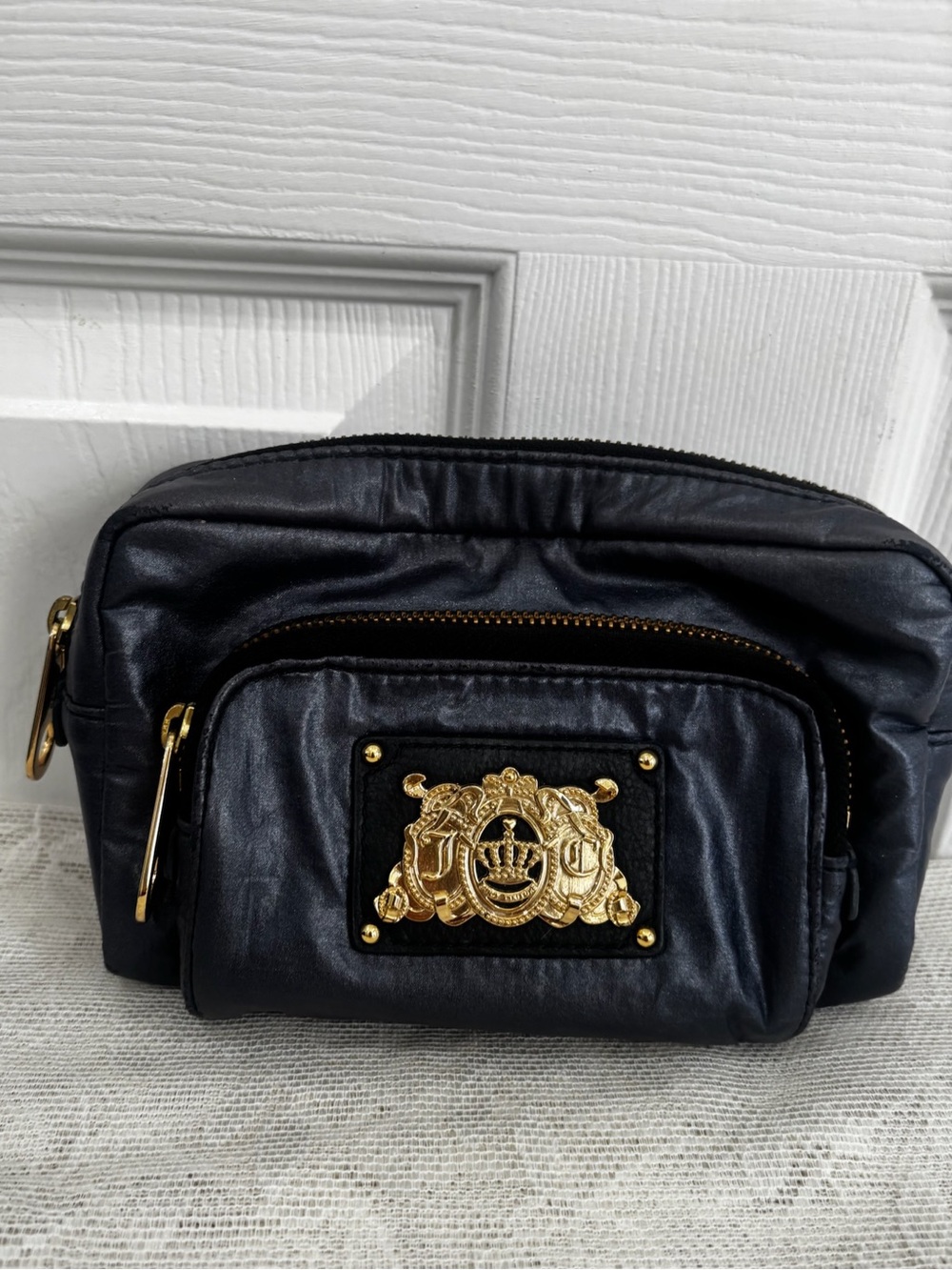 Juicy Couture Navy Leather Cosmetic Pouch with Gold Crest Accent